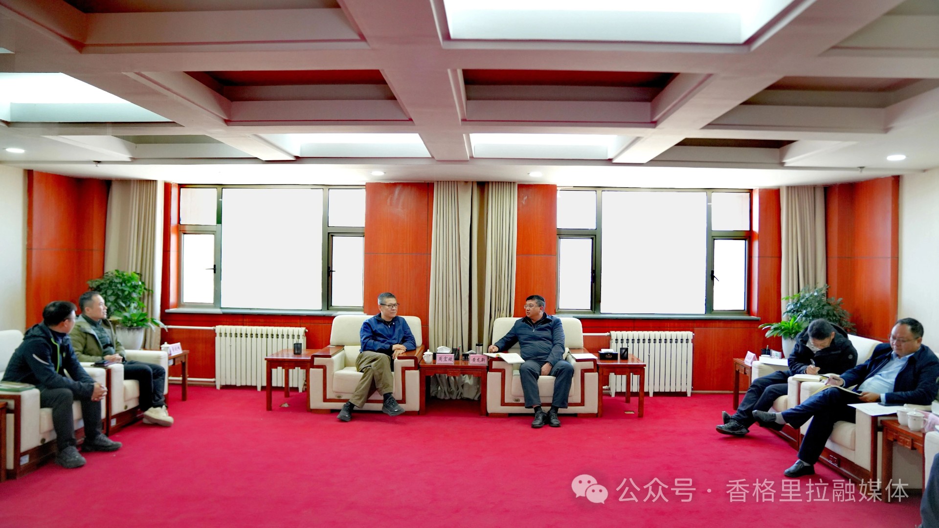 黄龙新与山行（浙江）农业科技有限责任公司董事长周宏斌一行会面座谈